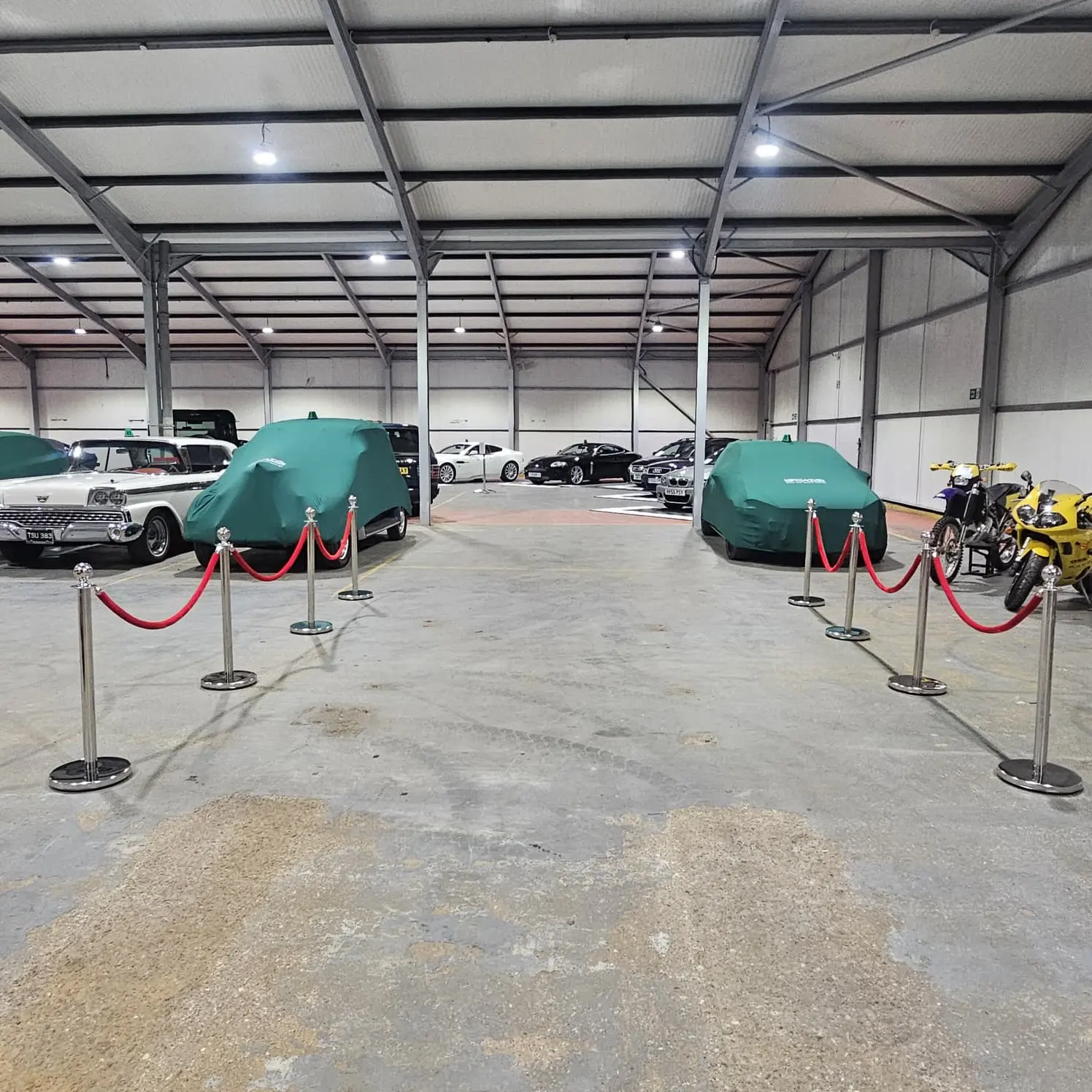 Covered vehicles prepared for a private display