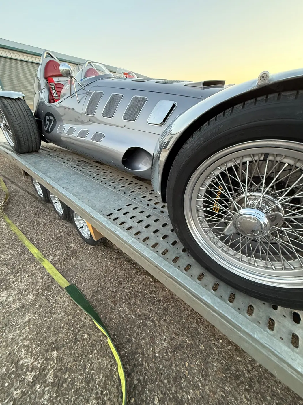 A classic vehicle arriving by specialist transporter